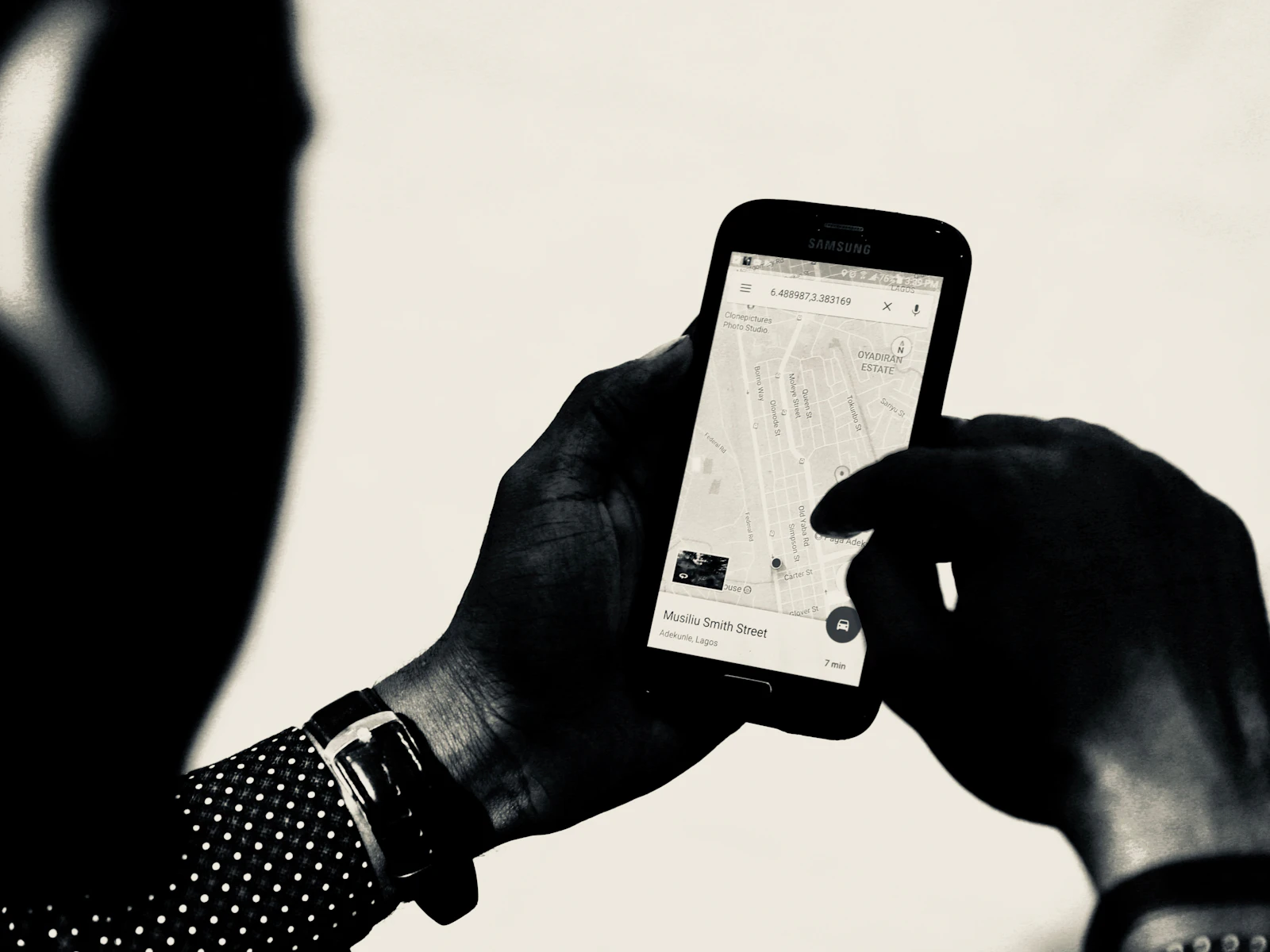 Person using a map app on a smartphone